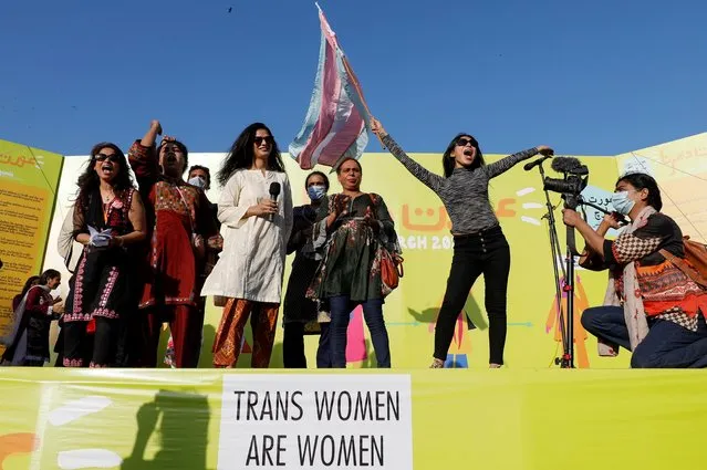 A group of trans rights activists react as they perform during Aurat March or Women's March, to mark the International Women's Day in Karachi, Pakistan on March 8, 2021. (Photo by Akhtar Soomro/Reuters)