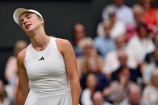 Ukraine's Elina Svitolina reacts as she plays against Czech Republic's Marketa Vondrousova during their women's singles semi-finals tennis match on the eleventh day of the 2023 Wimbledon Championships at The All England Lawn Tennis Club in Wimbledon, southwest London, on July 13, 2023. (Photo by Glyn Kirk/AFP Photo)