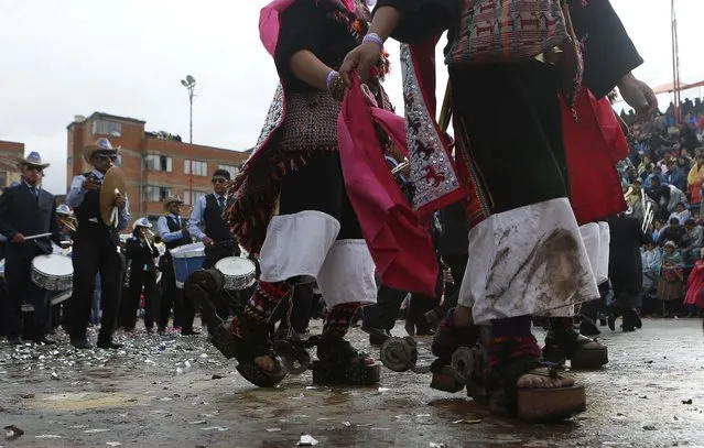 Pujllay dancers perform during the carnival celebrations in Oruro, Bolivia, Saturday February 14, 2015. (Photo by Juan Karita/AP Photo)