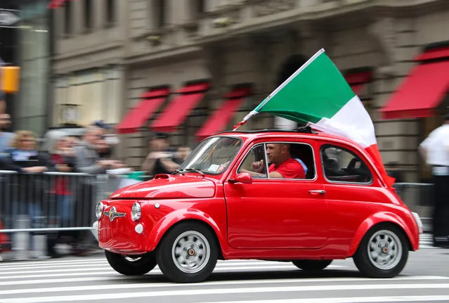 People attend the Columbus Day parade on Manhattan's Fifth Avenue in New York, the United States, on Oct. 8, 2018. Thousands of people participated in the celebration of the Italian American culture and heritage here on Monday. (Photo by Wang Ying/Xinhua News Agency via Getty Images/Barcroft Images)