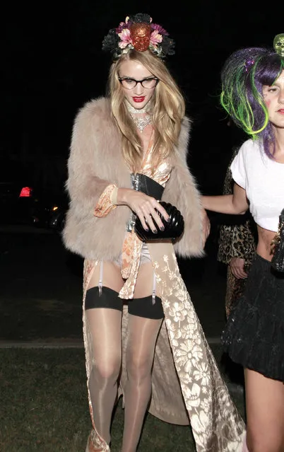 Celebrities attending a Halloween party in Beverly Hills, California on October 26, 2012. Celebrities attending a Halloween party in Beverly Hills, California on October 26, 2012. Pictured: Rosie Huntington. (Photo by Whiteley FameFlynet)