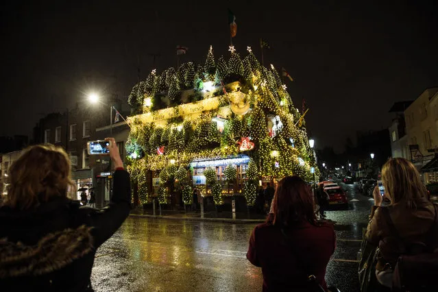 A general view of the Churchill Arms pub in Kensington on December 10, 2016 in London, England. The Churchill Arms has been decorated with 90 conifers and thousands of fairy lights for the Christmas period. (Photo by Jack Taylor/Getty Images)