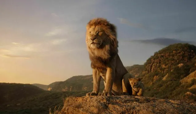 This image released by Disney shows the characters Mufasa, voiced by James Earl Jones, left, and Simba, voiced by JD McCrary, in a scene from “The Lion King”, directed by Jon Favreau. (Photo by Disney via AP Photo)