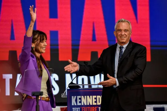 Independent presidential candidate Robert F. Kennedy, Jr. gestures next to Nicole Shanahan as she becomes the vice presidential candidate of Kennedy, in Oakland, California on March 26, 2024. (Photo by Laure Andrillon/Reuters)