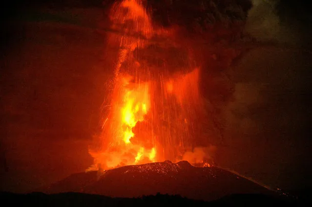 Shinmoedake peak spews molten lava as the peak erupts between Miyazaki and Kagoshima prefectures, southwestern Japan on April 5, 2018. (Photo by Reuters/Kyodo News)