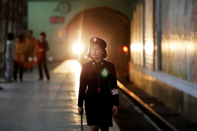 Damir Sagolj has won Reuters photojournalist of the year for his 2016 work, which included documenting the deadly Philippine drug war and the North Korea congress. Here: A subway worker walks away after a train departed the station in central Pyongyang, North Korea May 7, 2016. (Photo by Damir Sagolj/Reuters)
