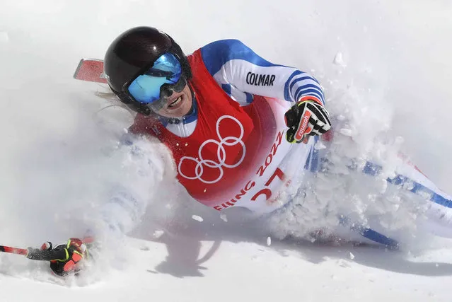 Camille Cerutti, of France crashes during the women's downhill at the 2022 Winter Olympics, Tuesday, February 15, 2022, in the Yanqing district of Beijing. (Photo by Alessandro Trovati/AP Photo)