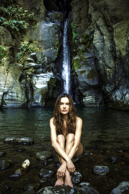 Alessandra Ambrosio stunned as she sat in front of a waterfall. The Brazilian model, 43, posed for Vogue Portugal in the last decade of June 2024. (Photo by Elio Nogueira/Vogue Magazine)