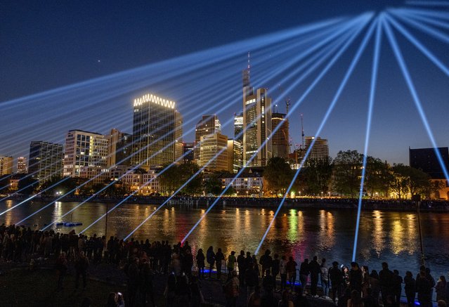 A light show is presented on occasion of the celebrations of the 175th birthday of the first German constitution in Frankfurt, Germany, Thursday, May 18, 2023. (Photo by Michael Probst/AP Photo)