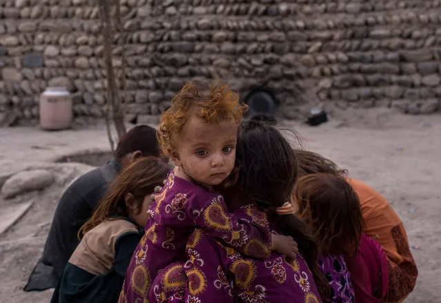 Children of families displaced by the Islamic State of Iraq and Syria -Khorasan (ISIS-K) play at their current home on July 14, 2017, in Surkh Rod District, Afghanistan. (Photo by Andrew Renneisen/Getty Images)