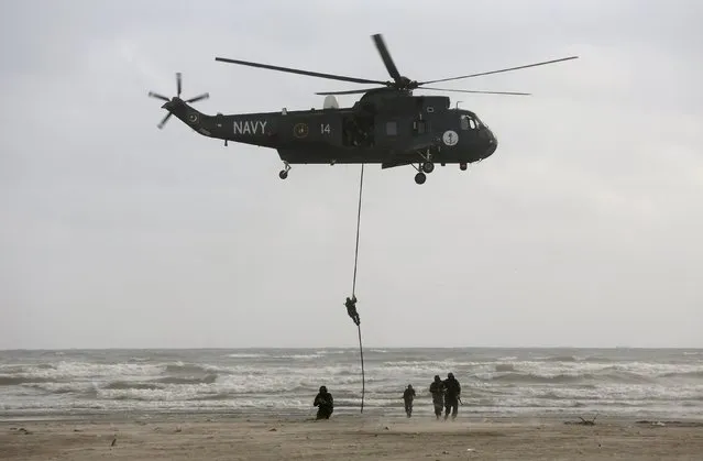 Members of Pakistan Navy's SSG perform during a ceremony to mark Pakistan's Defence Day, or Memorial Day, in Karachi, Pakistan, September 6, 2015. (Photo by Akhtar Soomro/Reuters)