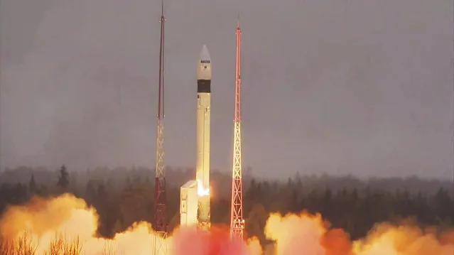 In this photo provided bi the European Space Agency ESA, the atmosphere-monitoring satellite for Europe’s Copernicus programme, Sentinel-5P, lifted off from the Plesetsk Cosmodrome in northern Russia Friday, October 13, 2017.  A Russian booster rocket on Friday successfully put a European atmosphere monitoring satellite into orbit. The European Space Agency’s Sentinel-5P satellite was launched Friday by a Rokot missile from the Plesetsk launch pad in northwestern Russia. The satellite will map the global atmosphere every day, helping study air pollution. (Photo by ESA via AP Photo)