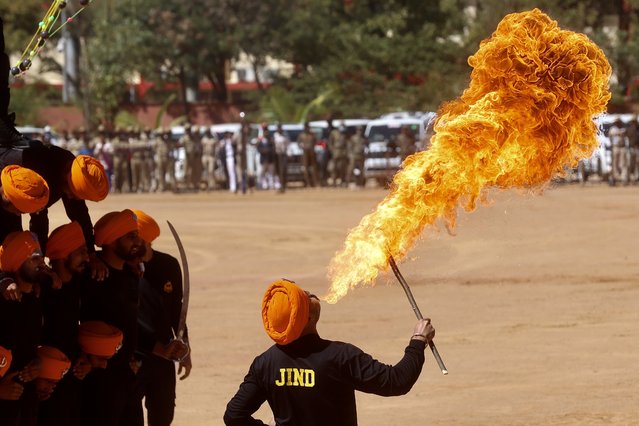 Indian Army personnel from the Madras Engineering Group (MEG) display their martial arts skills during the 76th Republic Day parade in Bangalore, India, 26 January 2025. (Photo by Jagadeesh N.V./EPA/EFE)