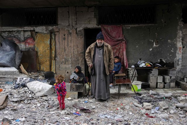 Talal Al-Assali, 64, poses in front of his destroyed home in Jabalia, northern Gaza Strip, on February 9, 2025. (Photo by Bashar Taleb/AFP Photo)