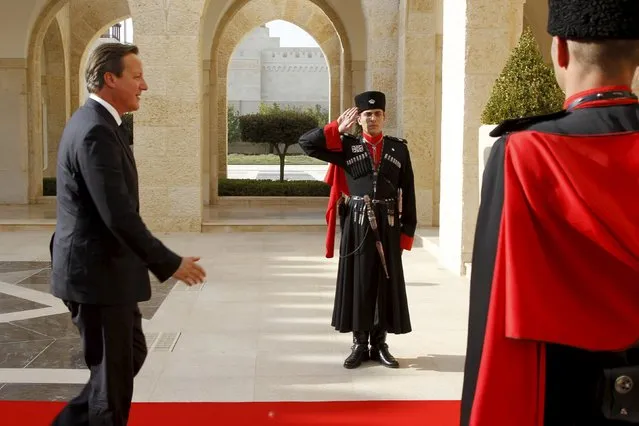 British Prime Minister David Cameron arrives to meet Jordan's King Abdullah at the Royal Palace in Amman, Jordan, September 14, 2015. (Photo by Majed Jaber/Reuters)