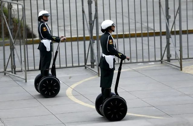 Peruvian policewomen ride segways to patrol the venues of the 2015 IMF/World Bank annual meetings event in Lima, October 6, 2015. (Photo by Mariana Bazo/Reuters)
