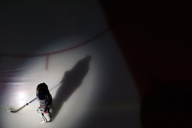 Stuart Skinner #74 of the Edmonton Oilers listens to the national anthem against the Florida Panthers in Game Four of the 2025 Stanley Cup Final at Amerant Bank Arena on June 12, 2025 in Sunrise, Florida. (Photo by Steph Chambers/Getty Images/AFP Photo)