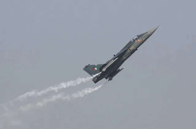 An Indian Air Force (IAF) light combat aircraft “Tejas” performs during the Indian Air Force Day celebrations at the Hindon Air Force Station on the outskirts of New Delhi, India, October 8, 2016. (Photo by Adnan Abidi/Reuters)