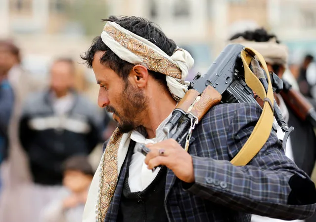 A tribesman performs the traditional Baraa dance as he carries a weapon during a tribal gathering held to show support to the Houthi movement in Sanaa, Yemen November 10, 2016. (Photo by Khaled Abdullah/Reuters)