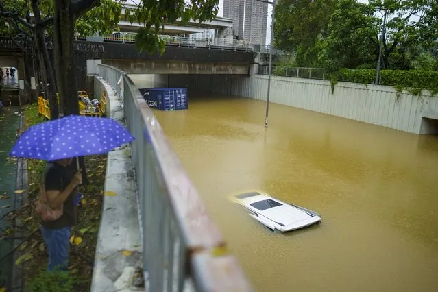 Vehicles submerged in floodwater during heavy rain in Hong Kong, China, on September 8, 2023. Hong Kong's heaviest rainstorm since records began in 1884 flooded the financial hub's streets and sent torrents of water rushing through subway stations, bringing much of the city to a standstill and forcing the stock market to halt morning trading on Friday. (Photo by Justin Chin/Bloomberg)