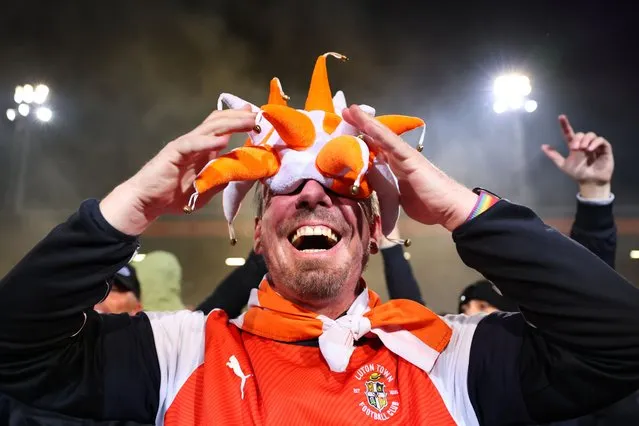 A Luton Town fan celebrates after the win during the Sky Bet Championship Play-Off Semi-Final Second Leg match between Luton Town v Sunderland at Kenilworth Road on May 16, 2023 in Luton, United Kingdom. (Photo by Marc Atkins/Getty Images)