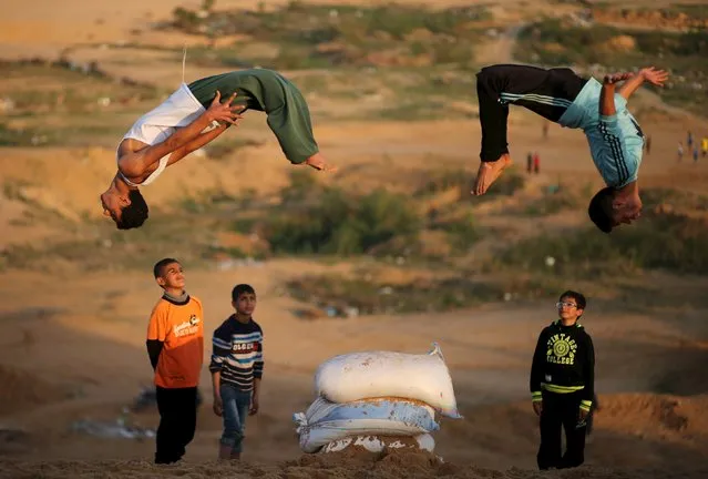 Palestinian boys demonstrate their parkour skills in Gaza City, January 22, 2016. (Photo by Mohammed Salem/Reuters)