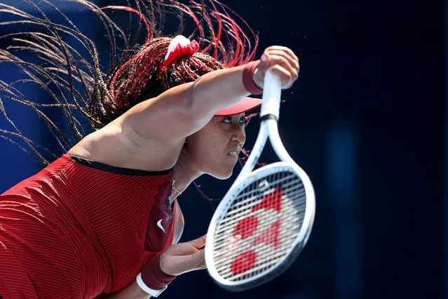 Naomi Osaka of Team Japan serves during her Women's Singles First Round match against Saisai Zheng of Team China on day two of the Tokyo 2020 Olympic Games at Ariake Tennis Park on July 25, 2021 in Tokyo, Japan. (Photo by Clive Brunskill/Getty Images)