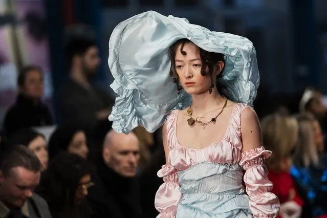 A model presents a creation by designer Yuhan Wang for the Fashion East during the London Fashion Week 2019 in Central London, Britain, 17 February 2019. (Photo by Will Oliver/EPA/EFE)