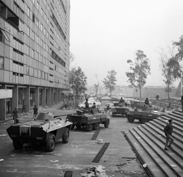 In this October 3, 1968 file photo, armored cars are lined up on the Plaza of the Three Cultures in Mexico City, after fierce clashes the previous night between Mexican forces and striking students. As Mexico marks the 50-year anniversary of Tlatelolco, the massacre remains something of an open wound: Nobody knows exactly how many died when soldiers opened fire on a peaceful demonstration, and it wasn't until 2018 that a government agency acknowledged for the first time that it was “a state crime”. (Photo by AP Photo)