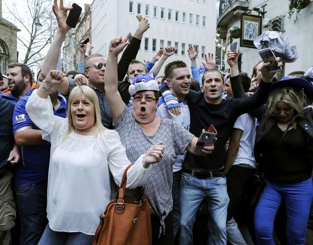 Leicester City fans celebrate in the street after their team's away soccer match against Manchester United, outside Hogarth's pub in Leicester, Britain May 1, 2016. (Photo by Eddie Keogh/Reuters)