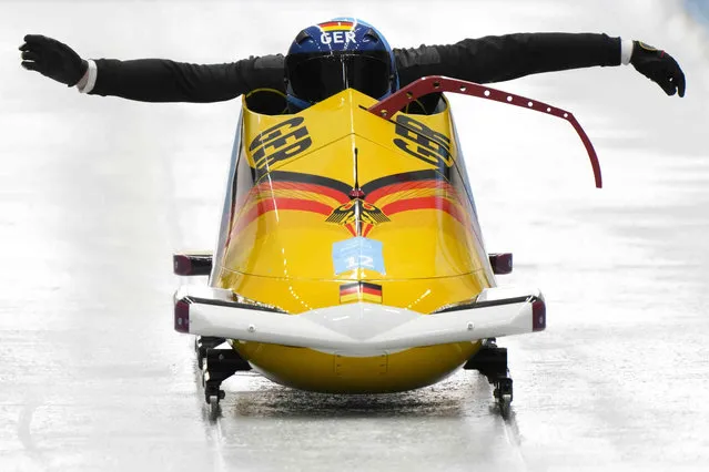 Mariama Jamanka of Germany starts a run during a 2-woman bobsled training at the 2022 Winter Olympics, Wednesday, February 16, 2022, in the Yanqing district of Beijing. (Photo by Mark Schiefelbein/AP Photo)