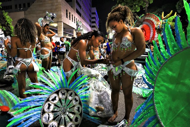 Members of Imperio Serrano samba school get ready prior to their entrance during 2023 Carnival parades at Marquês de Sapucaí Sambodrome on February 19, 2023 in Rio de Janeiro, Brazil. (Photo by Buda Mendes/Getty Images)