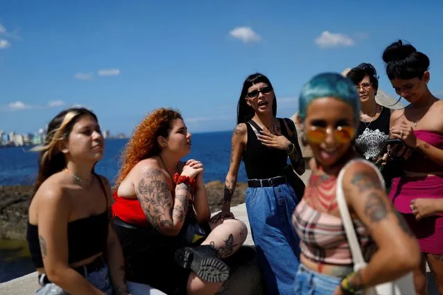 Women with tattoos gather in Havana, Cuba, February 27, 2022. (Photo by Amanda Perobelli/Reuters)