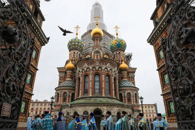 Participants in a religious procession to the Kazan Cathedral on International Orthodox Youth Day in St Petersburg, Russia on February 16, 2020. The holiday was initiated by the Syndesmos World Fellowship of Orthodox Youth. The Russian Orthodox Church takes part in celebrations since 2002. (Photo by Peter Kovalev/TASS)