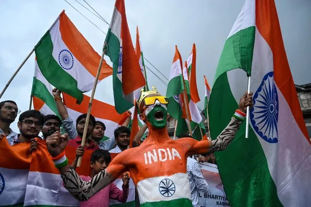 An activist of Akhil Bharatiya Vidyarthi Parishad (ABVP) shout pro-India slogans during the celebrations to mark India's 75th Independence Day at Lal Chowk in Srinagar on August 15, 2022. (Photo by Tauseef Mustafa/AFP Photo)