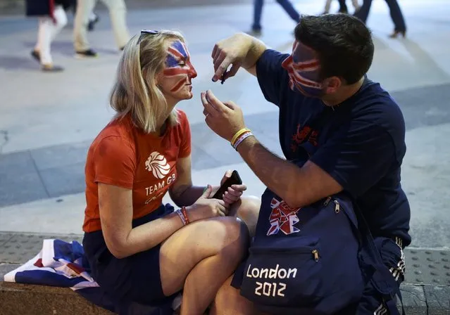 2016 Rio Olympics, Opening ceremony, Maracana, Rio de Janeiro, Brazil on August 5, 2016. Great Britain fans face painting outside Maracana ahead of the opening ceremony. (Photo by Alkis Konstantinidis/Reuters)