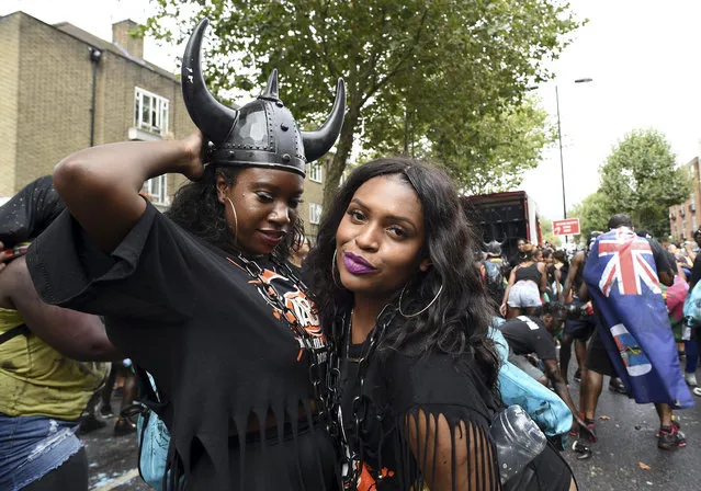  Revellers take part in the Notting Hill Carnival on August 28, 2016 in London, England. (Photo by Ben A. Pruchnie/Getty Images)