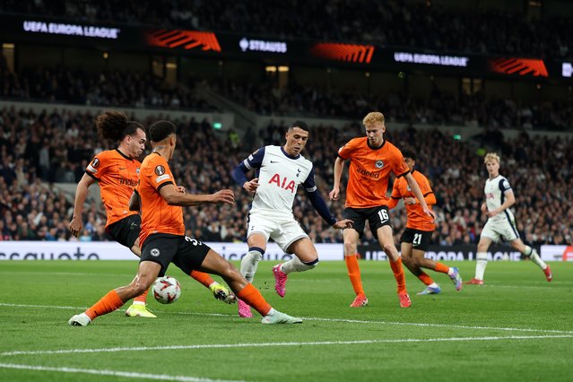 Pedro Porro of Tottenham Hotspur scores his team's first goal whilst under pressure from Arthur Theate and Tuta of Eintracht Frankfurt during the UEFA Europa League 2024/25 Quarter Final First Leg match between Tottenham Hotspur and Eintracht Frankfurt at Tottenham Hotspur Stadium on April 10, 2025 in London, England. (Photo by Alex Pantling/Getty Images)