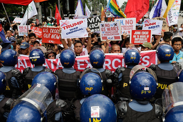 Police block protesters attempting to reach the United States embassy during a rally marking Araw ng Kagitingan (Day of Valor) in Manila, Philippines, 09 April 2025. Protesters opposed the Philippines-US Balikatan joint military exercises expected to be held in various locations in the country within the month of April. Day of Valor in the Philippines is observed to honor Filipino service men and women who sacrificed their lives for the country throughout history. (Photo by Rolex dela Peña/EPA/EFE)