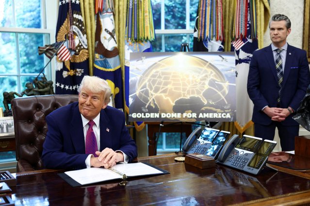 U.S. President Donald Trump makes an announcement regarding the Golden Dome missile defense shield next to U.S. Defense Secretary Pete Hegseth in the Oval Office of the White House in Washington, D.C., U.S., May 20, 2025. (Photo by Kevin Lamarque/Reuters)