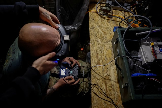 Oleksandr, 33, a Ukrainian serviceman of the 72nd Chorni Zaporozhtsi Separate Mechanized Brigade of the Ukrainian Armed Forces with the call sign 'Mikha', operates a first-person view (FPV) drone towards Russian troops, during the unilaterally proposed three-day ceasefire declared by Russia, amid Russia's attack on Ukraine, near a frontline in Dnipropetrovsk region, Ukraine on May 8, 2025. (Photo by Alina Smutko/Reuters)