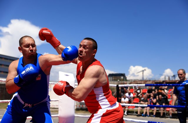 Inmates compete in the ring during the National Boxing Tournament at the Central Prison in Sofia, Bulgaria, 03 June 2025. 'With Gloves against Agresia' was the motto of this year's Boxing Tournament, which was organized by the Bulgarian Boxing Federation and featured all Bulgarian jails. (Photo by Vassil Donev/EPA)