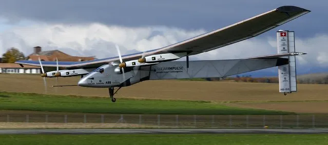 The solar-powered Solar Impulse 2 experimental aircraft, piloted by Swiss Bertrand Piccard, is pictured during a test flight in Payerne November 13, 2014. (Photo by Ruben Sprich/Reuters)