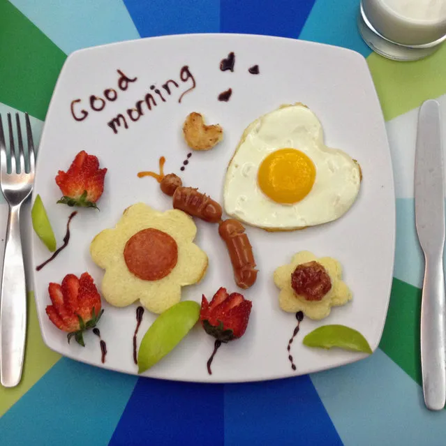 Anne's egg art with a good morning message and butterfly with sausages, strawberries and eggs. (Photo by Anne Widya/Caters News)