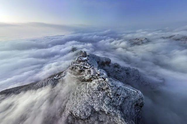 Aerial view of Wangwu Mountain National Geopark shrouded in fog on February 14, 2023 in Jiyuan, Henan Province of China. (Photo by Deng Guohui/VCG via Getty Images)