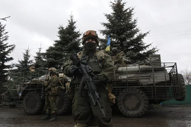 Ukrainian servicemen patrol an area near the eastern Ukrainian town of Debaltseve in Donetsk region, December 24, 2014. (Photo by Valentyn Ogirenko/Reuters)