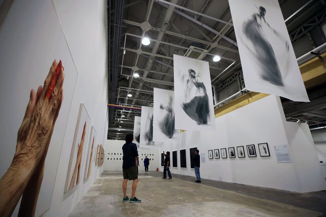 On the September 24, 2025, the 2025 Busan International Photo Festival was held at F1963 Seokcheon Hall in Suyeong-gu, Busan, where visitors and staff are examining works. This year's Busan International Photo Festival, which runs from that day until the 14th of next month, is curated by Artistic Director Lee Il-woo. Around 200 photographers from 24 countries will participate, showcasing diverse works reinterpreted through Korean perspectives and sentiments, under the theme of “Soul Fire”. (Photo by Kim Dong-hwan)