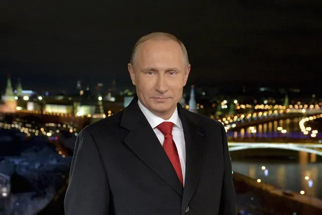 Russia's President Vladimir Putin makes his annual New Year address to the nation in Moscow December 31, 2014. Putin said in a televised New Year's address on Wednesday that the “return home” of Ukraine's Crimea peninsula to Moscow's control would forever remain an important chapter in Russia's history. (Photo by Alexei Druzhinin/Reuters/RIA Novosti/Kremlin)