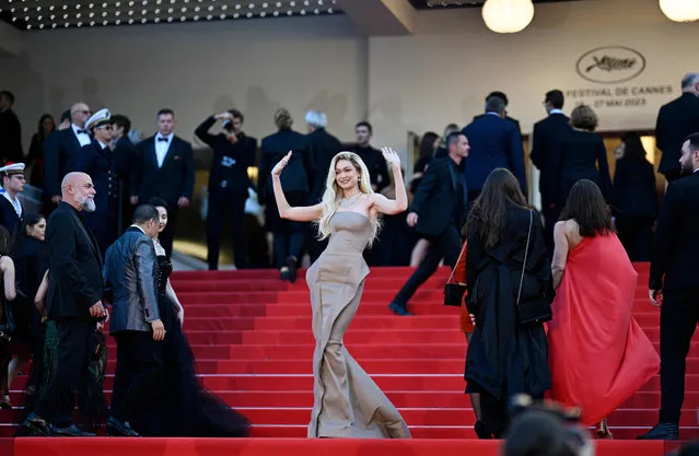 US model Gigi Hadid (C) arrives for the screening of the film “Firebrand” during the 76th edition of the Cannes Film Festival in Cannes, southern France, on May 21, 2023. (Photo by Patrícia de Melo Moreira/AFP Photo)