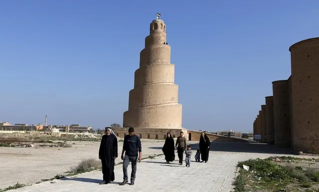 People visit the Spiral Minaret of the Great Mosque in Samarra, Iraq February 3, 2016. (Photo by Ahmed Saad/Reuters)